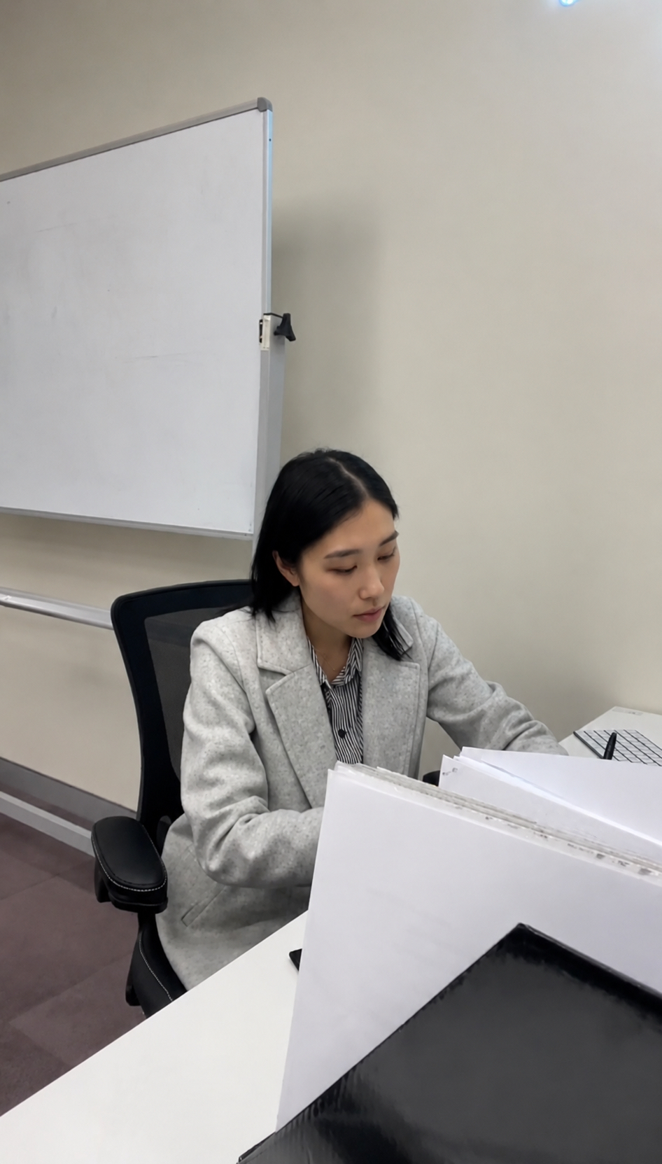 Cloe, founder of Medium C, at her desk